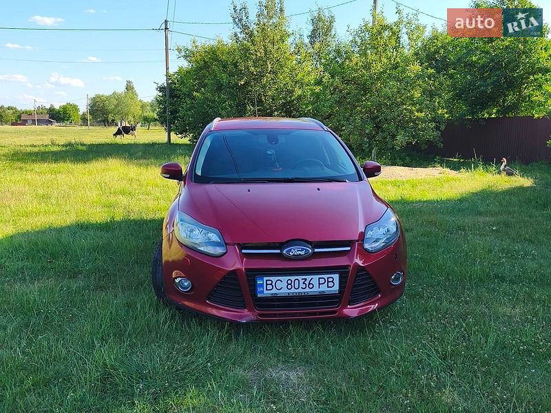 2011 Ford Focus, VIN WF0LXXGCBLBL04818:plate — фото 1 (autoria)