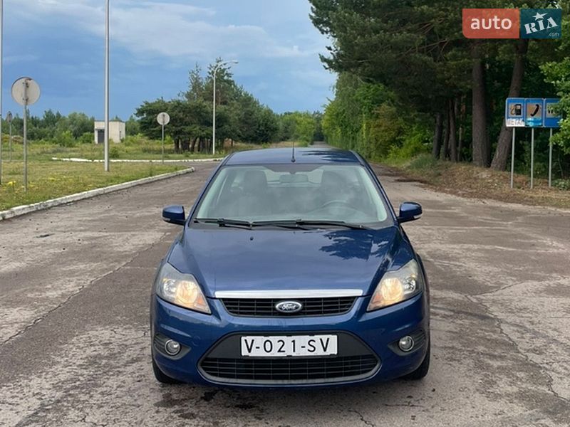 2009 Ford Focus, VIN WF0SXXGCDS9J58372:plate — фото 1 (autoria)