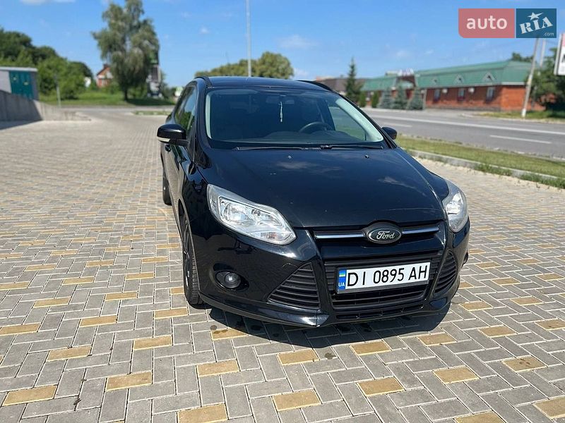 2012 Ford Focus, VIN WF0LXXGCBLCC05323:plate — фото 1 (autoria)