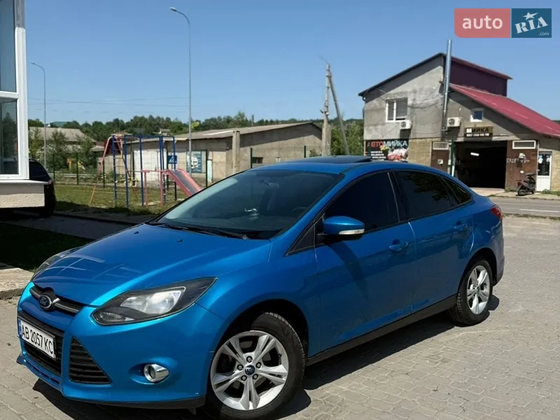 Ford Focus 2014 VIN 1FADP3F28EL397251 фото оголошення 2 з 60