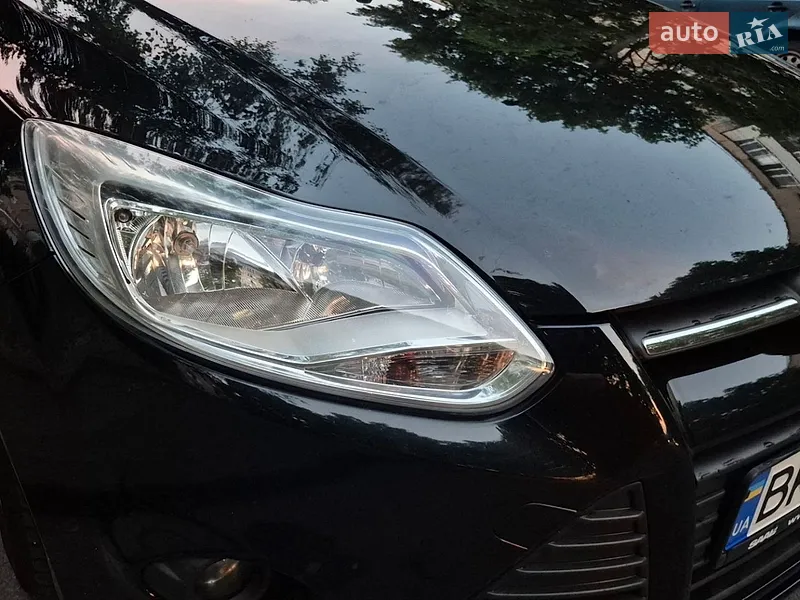 Ford Focus 2011 VIN WF0KXXGCBKBK72615 фото оголошення 13 з 77