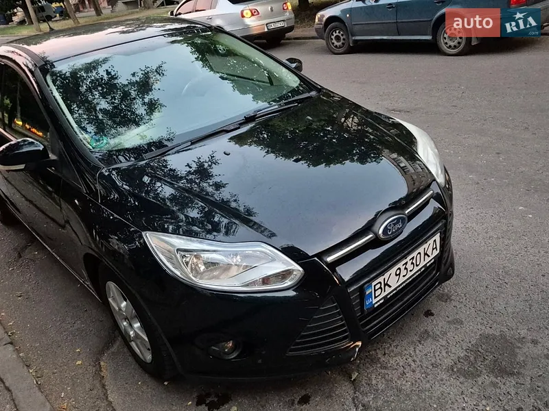 Ford Focus 2011 VIN WF0KXXGCBKBK72615 фото оголошення 14 з 77