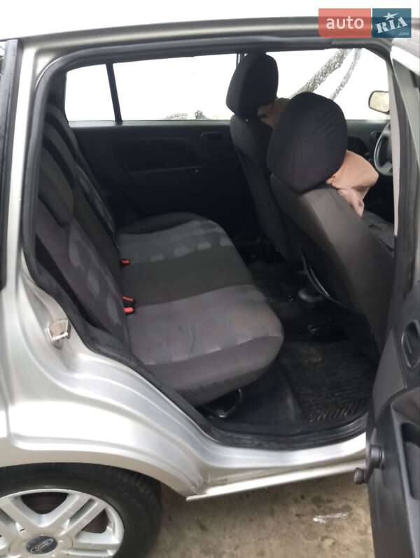 Хэтчбек Ford Fusion 2007 в Окнах фото 8 Хэтчбек Ford Fusion 2007 в Окнах