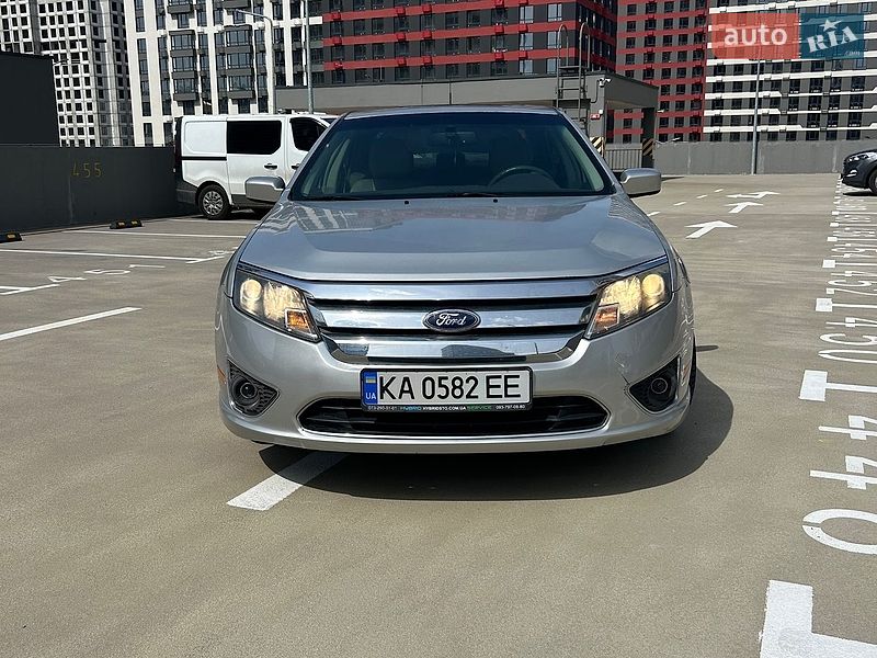 2010 Ford Fusion, VIN 3FADP0L36AR293753:plate — zdjęcie 1 (autoria)