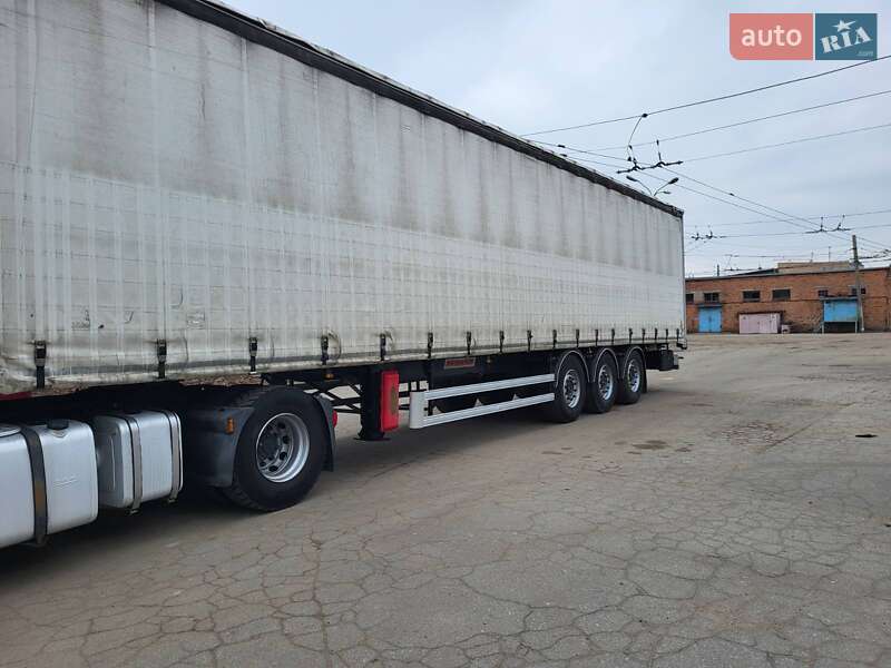 Тентований борт (штора) - напівпричіп Fruehauf TF34C1 2013 в 
