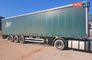 Тентований борт (штора) - напівпричіп Fruehauf TX 34 2003 в Львові