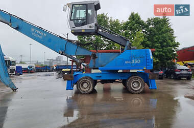 Экскаватор погрузчик Fuchs MHL-350 2010 в 