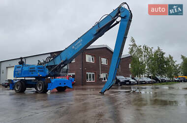 Экскаватор погрузчик Fuchs MHL-350 2010 в 