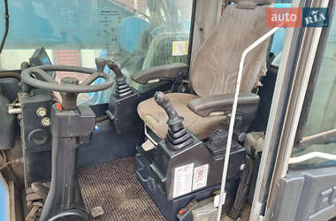 Экскаватор погрузчик Fuchs MHL-350 2010 в 