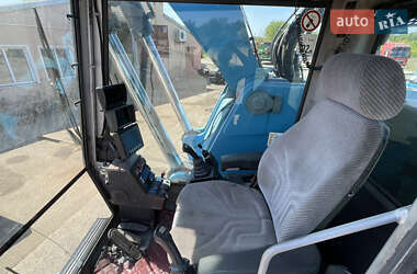 Экскаватор погрузчик Fuchs MHL 360 2008 в 