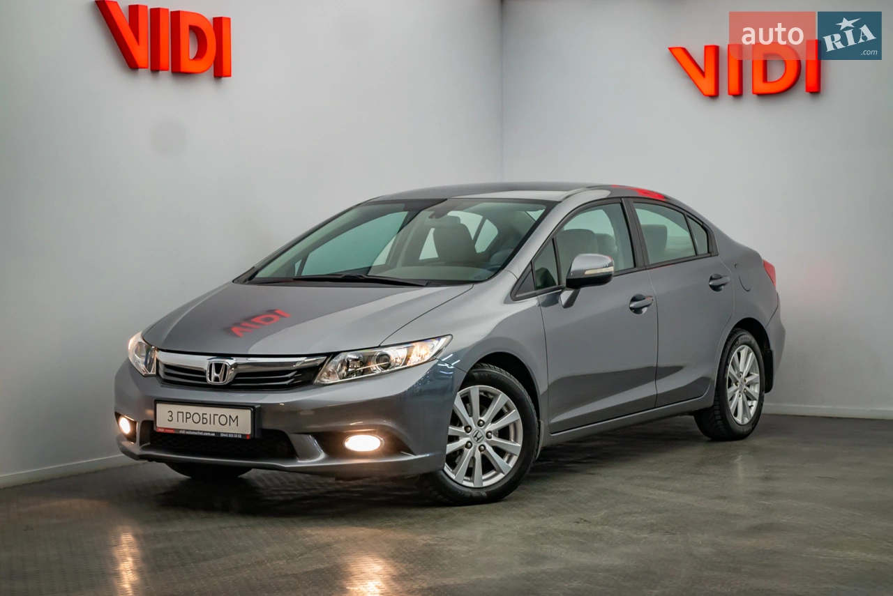 Офіційний автомобіль Honda Civic 2012 року - перевірений та надійний вибір!
Автомобіль пройшов комплексну перевірку та діагностику, що гарантує його технічну справність та юридичну чистоту. Пропонуємо лише перевірені авто з підтвердженим пробігом у відмінному стані.
Переваги цього авто:
- Один власник
- Cервісна книга
- Рідна фарба
- Клімат контроль з підігрівом 1-го ряду сидінь
- Задня камера
- Bluetooth

Всі розрахунки офіційно через банк, безпечно і прозоро
Кредит, лізинг, трейд-ін, зручні фінансові рішення для вас
Обмін та викуп авто, швидко та вигідно
Документальний супровід, без зайвих турбот
КАСКО та ОСЦПВ, вигідні страхові програми

Найбільший салон перевірених авто , працюємо 7 днів на тиждень. Обирайте надійність та комфорт разом із професіоналами!