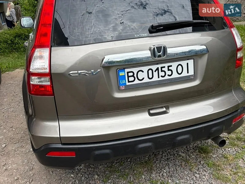 Honda CR-V 2009 VIN SHSRE78709U005797 фото оголошення 14 з 46