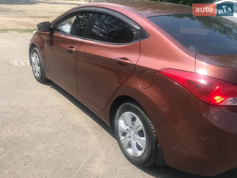 Hyundai Elantra 2013 VIN KMHDH41CADU691868 фото оголошення 2 з 47