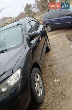 Внедорожник / Кроссовер Hyundai Santa FE 2009 в 