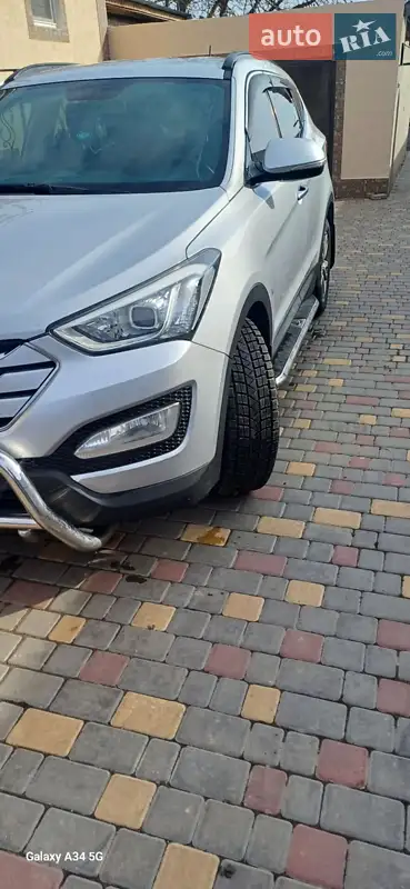 Hyundai Santa FE 2014 VIN KMHSW81UDFU329324 фото оголошення 10 з 53