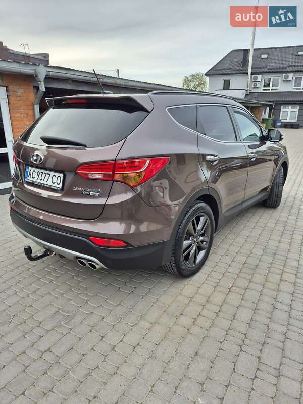 Внедорожник / Кроссовер Hyundai Santa FE 2014 в Нововолынске