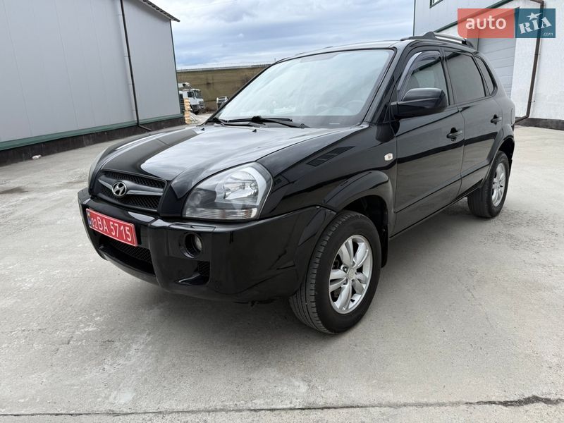 2009 Hyundai Tucson, VIN KMHJN81VAAU164891:plate — фото 1 (autoria)