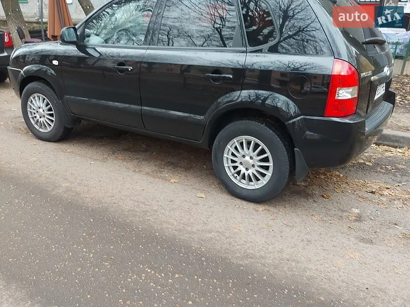 Hyundai Tucson 2005 VIN KMHJN81BP5U181618 фото оголошення 6 з 49