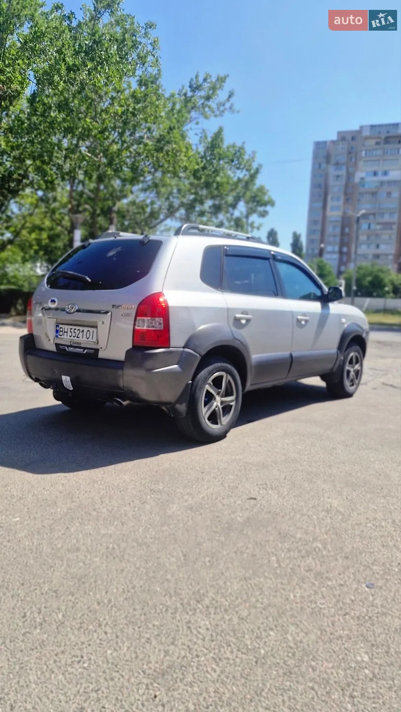 Hyundai Tucson 2006 VIN KMHJN81VP7U524192 фото оголошення 2 з 30
