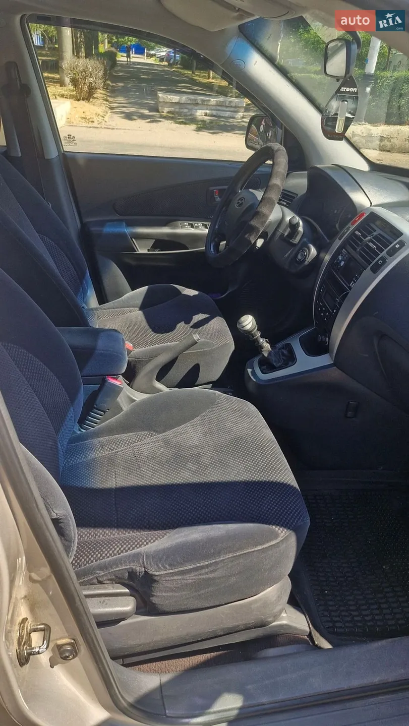 Hyundai Tucson 2006 VIN KMHJN81VP7U524192 фото оголошення 11 з 30