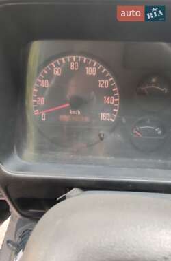Тентованый Isuzu NKR 2007 в 