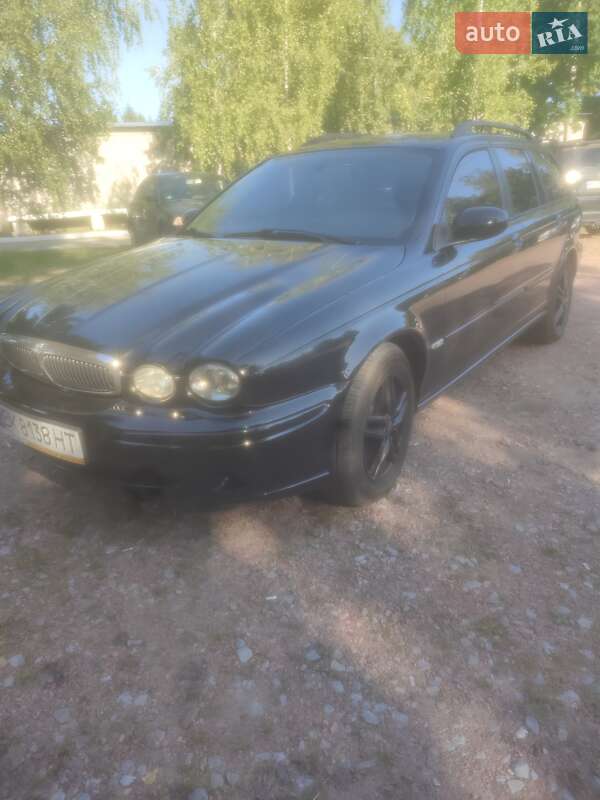 2005 Jaguar X-Type, VIN SAJAF55T556E67166:plate — photo 1 (autoria)