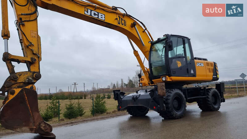 Колесный экскаватор JCB JS 200 2005 в Беляевке