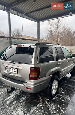 Внедорожник / Кроссовер Jeep Grand Cherokee 2002 в 
