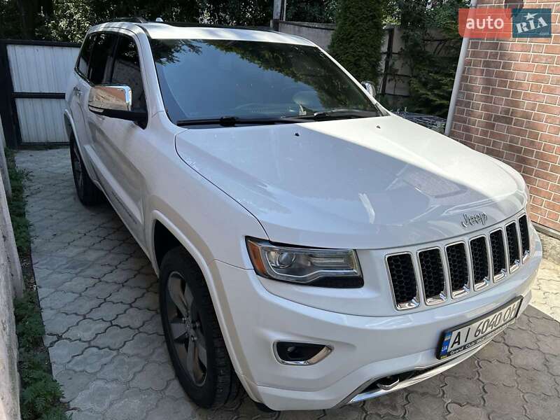 Внедорожник / Кроссовер Jeep Grand Cherokee 2013 в 