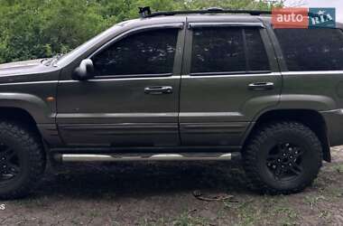 Внедорожник / Кроссовер Jeep Grand Cherokee 1999 в 