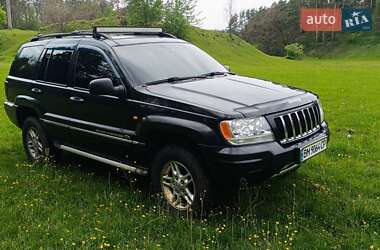 Внедорожник / Кроссовер Jeep Grand Cherokee 2004 в 