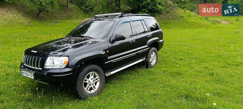 Внедорожник / Кроссовер Jeep Grand Cherokee 2004 в 