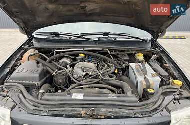Внедорожник / Кроссовер Jeep Grand Cherokee 2003 в 