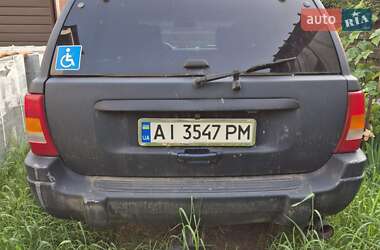Внедорожник / Кроссовер Jeep Grand Cherokee 2000 в 