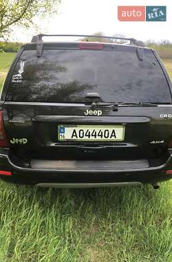 Внедорожник / Кроссовер Jeep Grand Cherokee 2004 в 