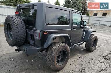 Внедорожник / Кроссовер Jeep Wrangler 2014 в 