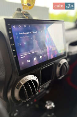 Внедорожник / Кроссовер Jeep Wrangler 2014 в 
