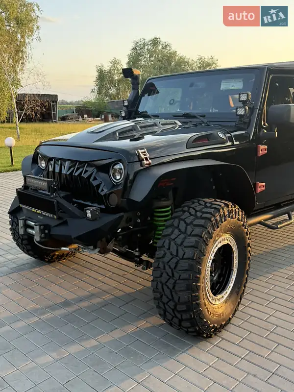 Jeep Wrangler 2015 VIN 1C4BJWCG5FL736361 фото оголошення 16 з 55