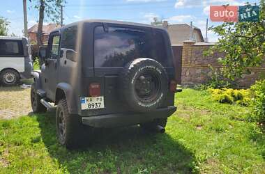 Внедорожник / Кроссовер Jeep Wrangler 1992 в 