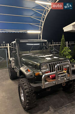 Внедорожник / Кроссовер Jeep Wrangler 1996 в  фото 2 Внедорожник / Кроссовер Jeep Wrangler 1996 в