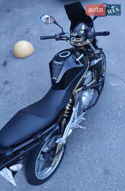 Мотоцикл Без обтекателей (Naked bike) Kawasaki ER 650 2006 в 