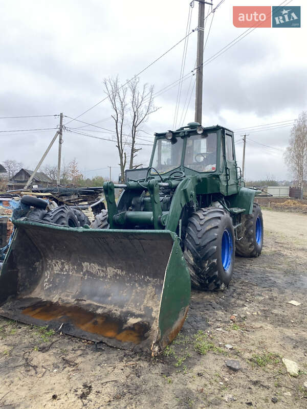 Фронтальні навантажувачі ХЗТСШ СШ 1990 в 