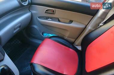 Минивэн Kia Carens 2006 в  фото 10 Минивэн Kia Carens 2006 в