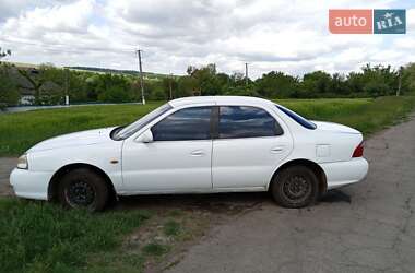 Седан Kia Clarus 1998 в Тальном фото 6 Седан Kia Clarus 1998 в Тальном