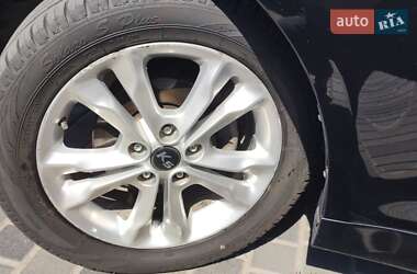 Седан Kia K5 2012 в 