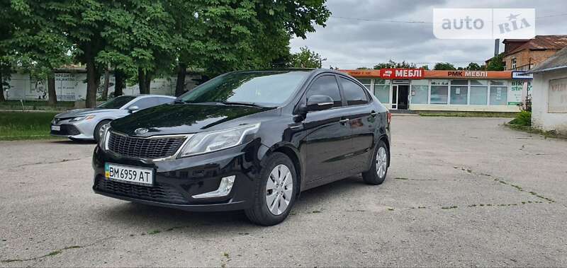 Седан Kia Rio 2012 в Ромнах