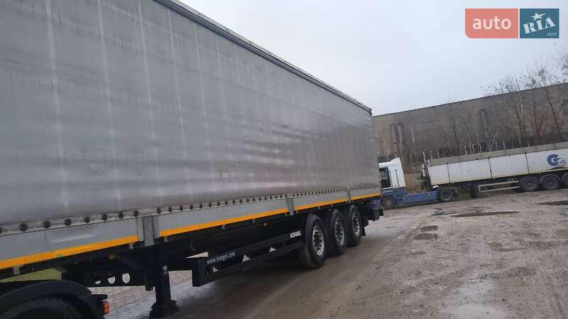 Тентований борт (штора) - напівпричіп Kogel S 24 2014 в Львові