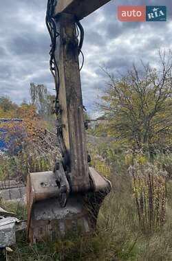 Гусеничный экскаватор Komatsu PC 210 2007 в 