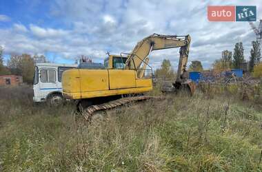 Гусеничный экскаватор Komatsu PC 210 2007 в 