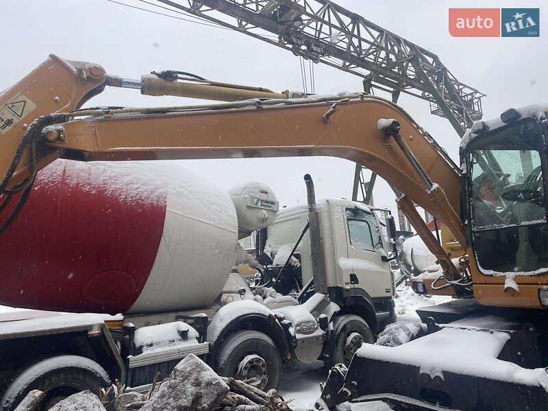 Колесный экскаватор Komatsu PW 2008 в Киеве